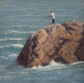 Boy fishing off Mumbles rocks.